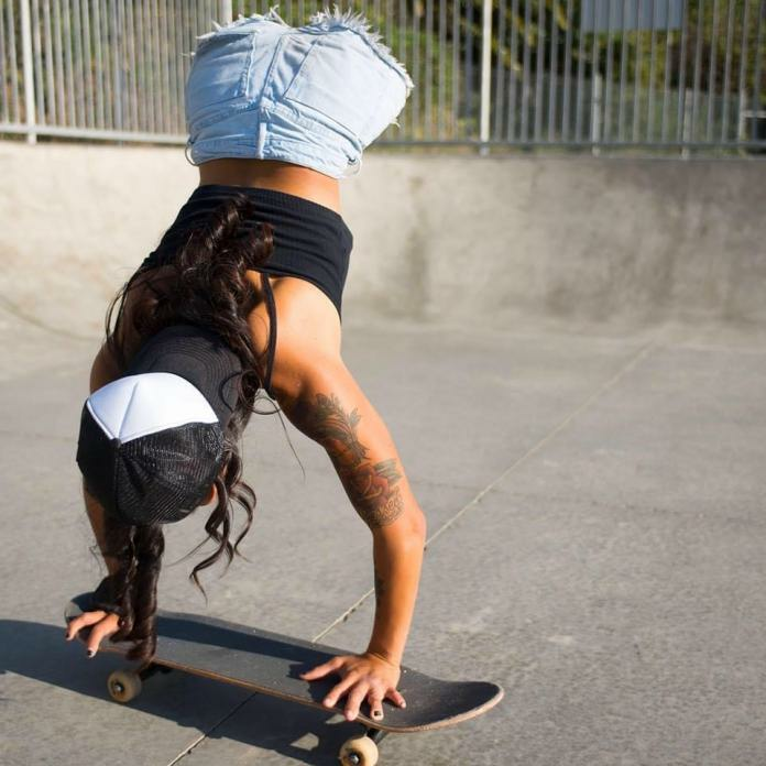 Kanya Sesser skateboarding flip.jpg